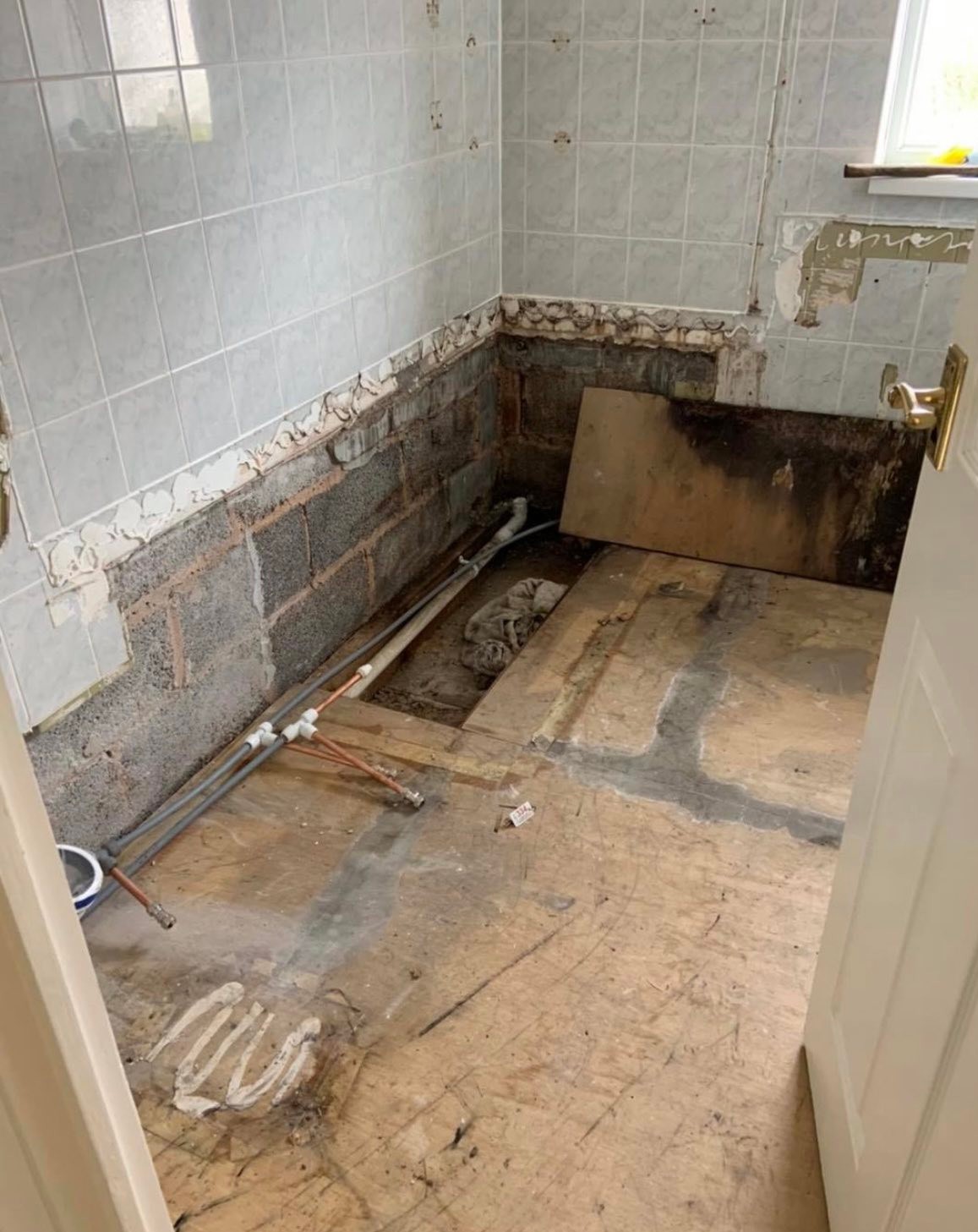 Bathroom leak remediation and refit – before, during and after
