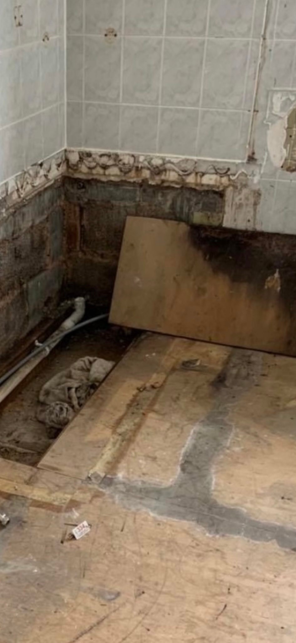 Bathroom leak remediation and refit – before, during and after