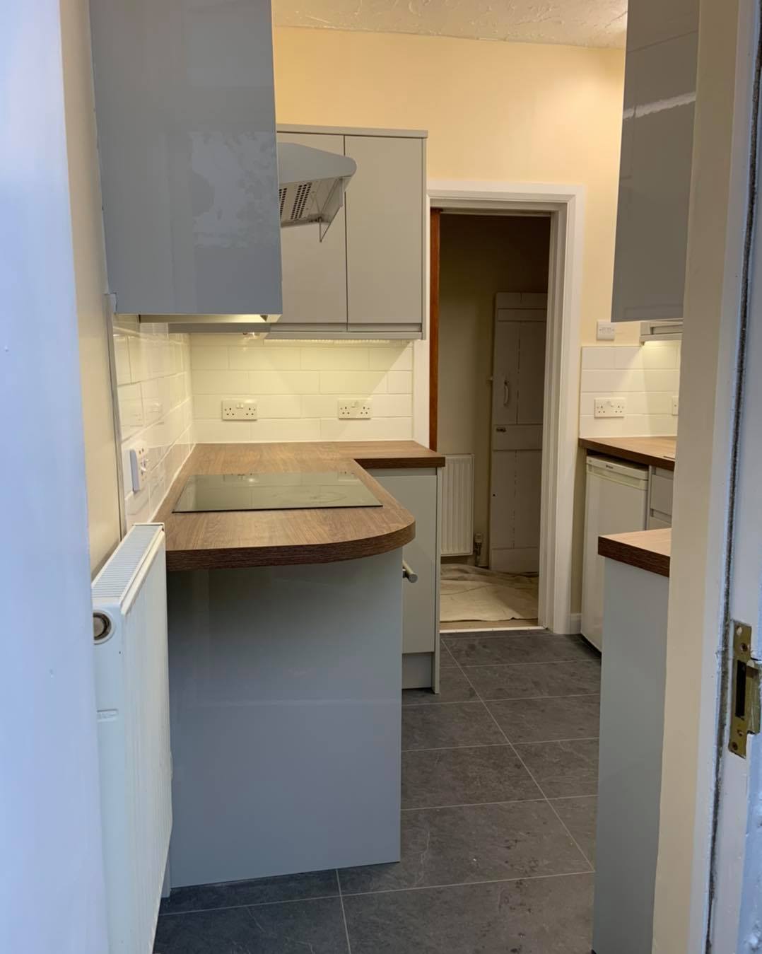 Kitchen water leak remediation and refit – before, during and after