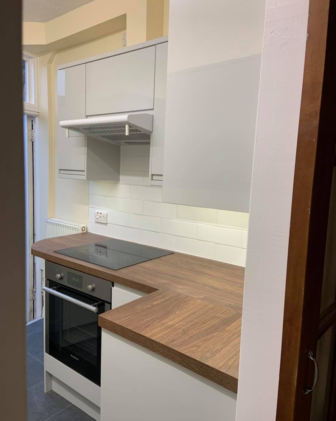 Kitchen water leak remediation and refit – before, during and after