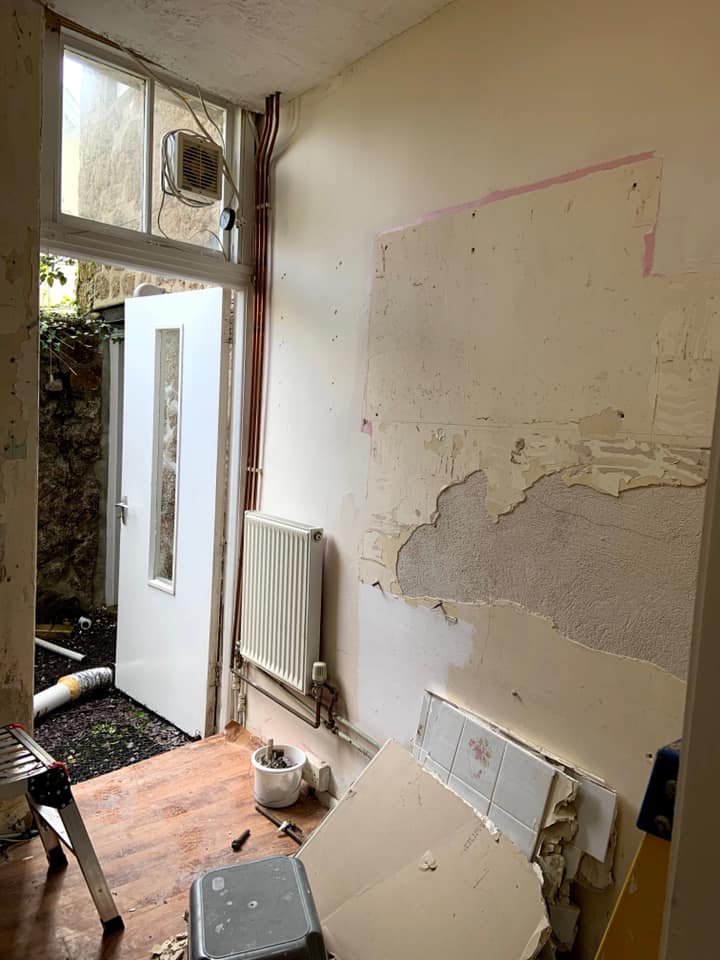 Kitchen water leak remediation and refit – before, during and after